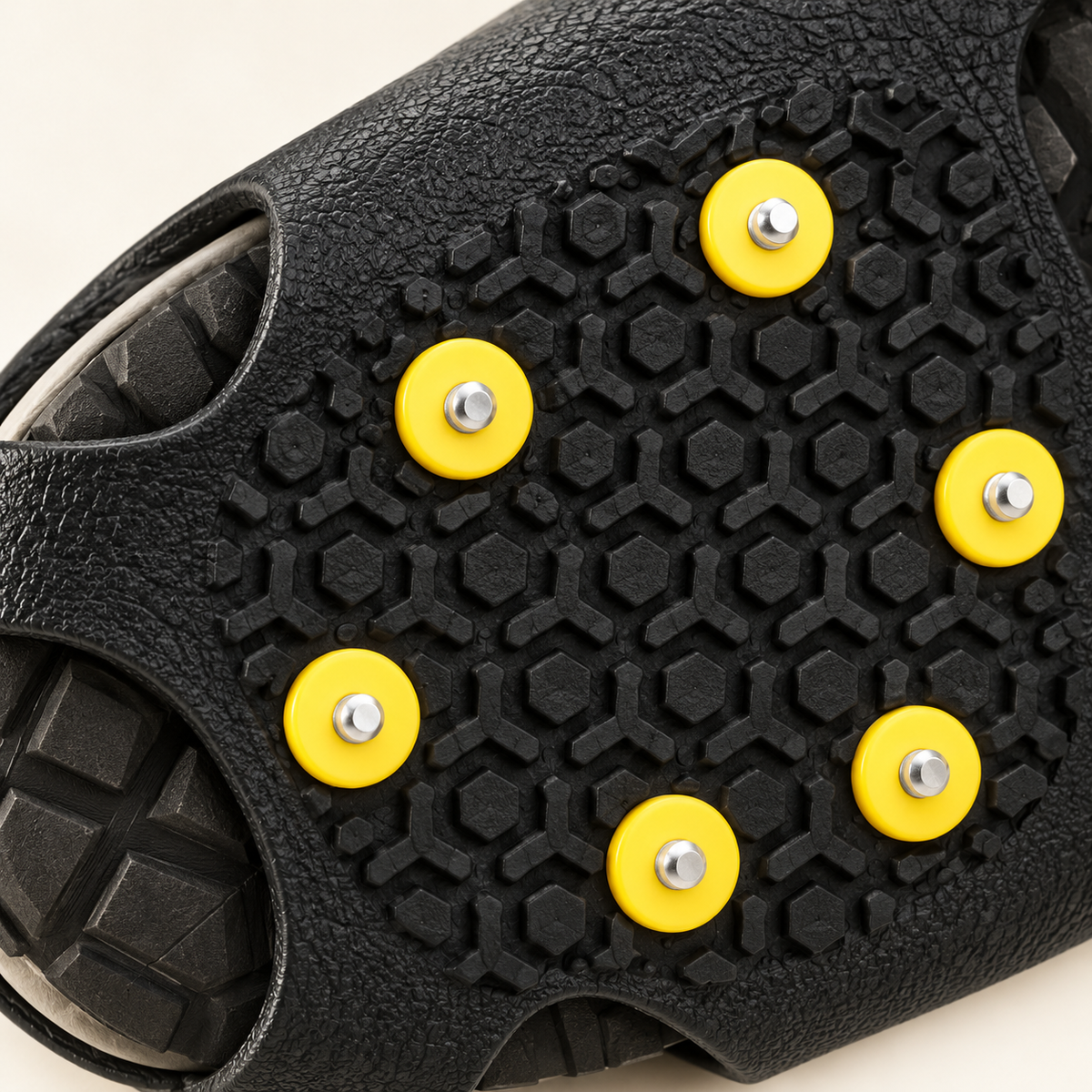 Black Traction Shoe Covers with Yellow Studs — detail — product illustration