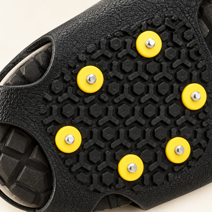 Black Traction Shoe Covers with Yellow Studs — detail — product illustration